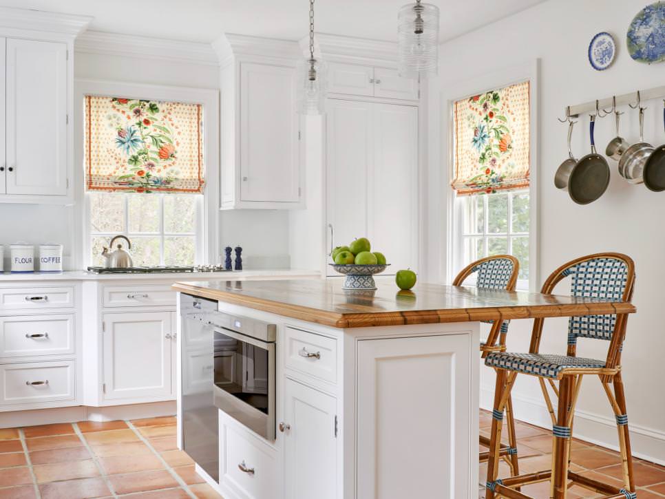white kitchen with floral roman shades remodel design