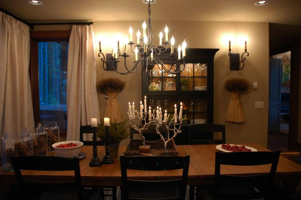 dining room with rustic iron chandelier
