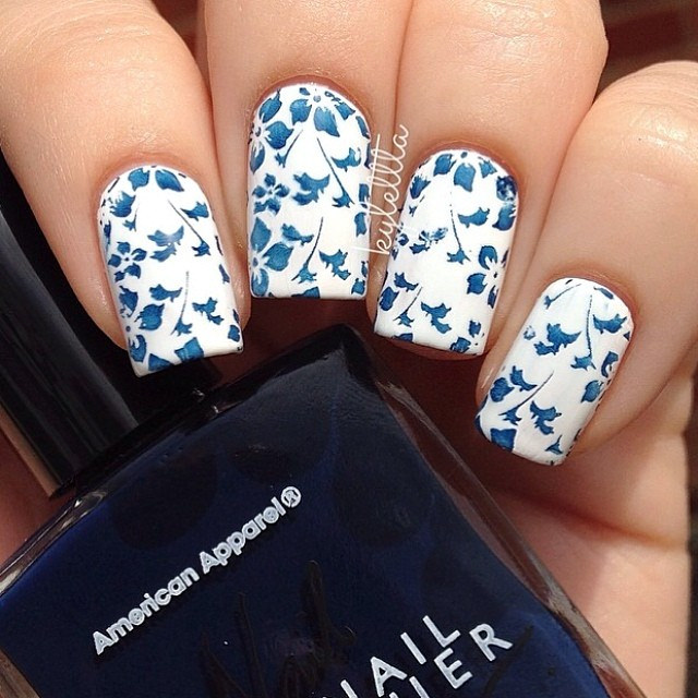 blue flowers on a nail 