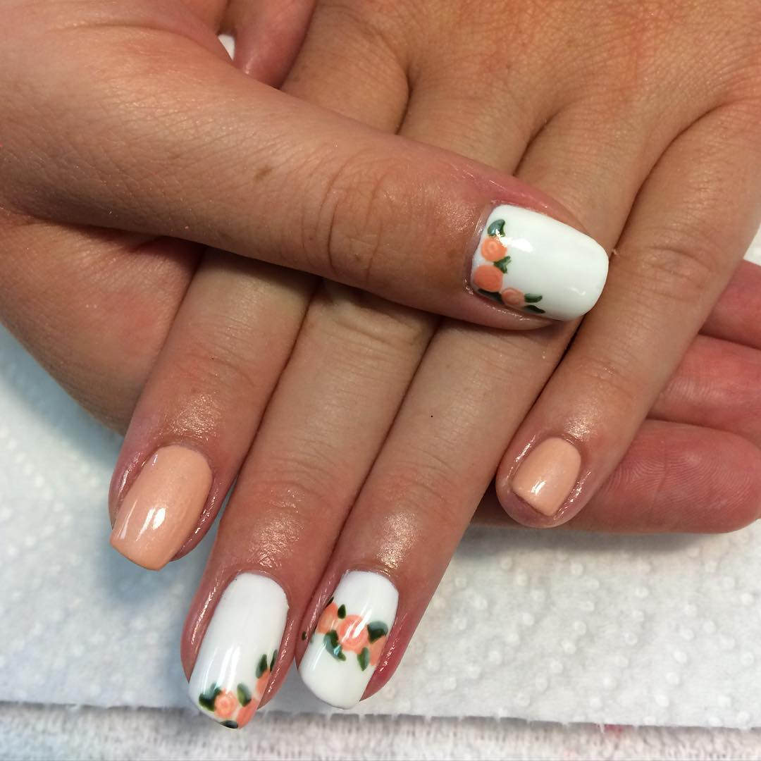 Different color nail with flower design pattern
