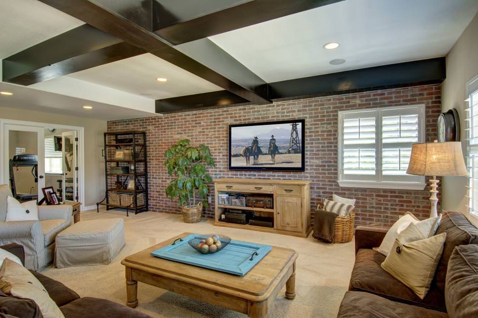 great living room with exposed brick wall design