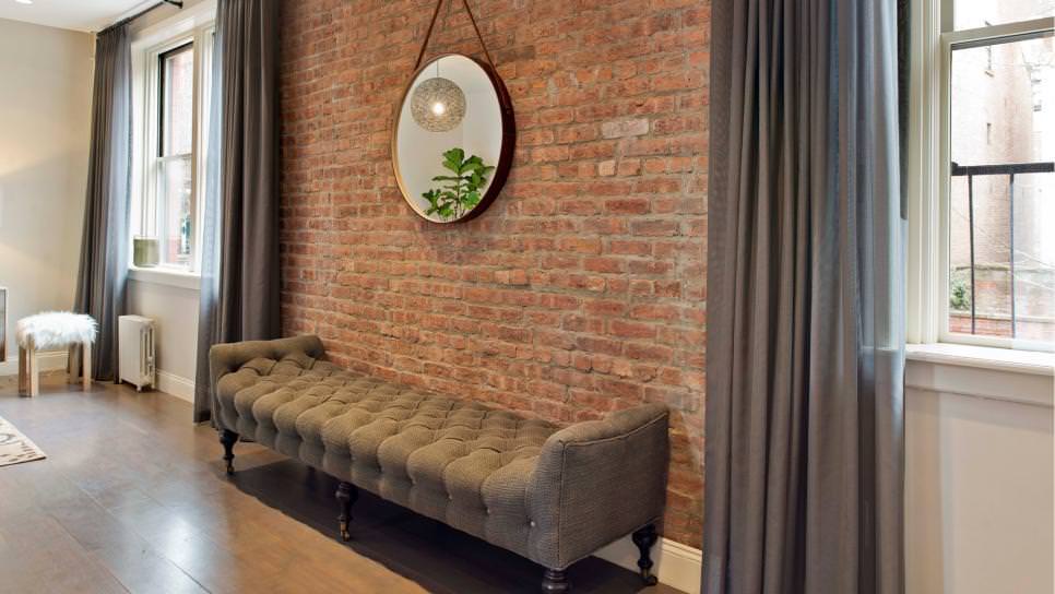 urban living room with brick accent wall design