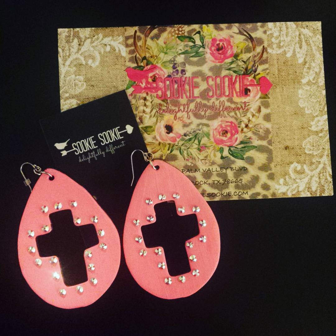 pink color cross earrings