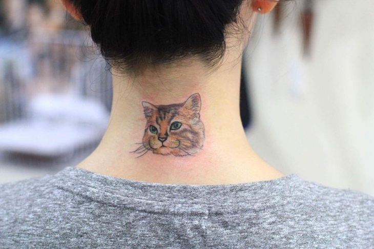 cat tattoo design on neck