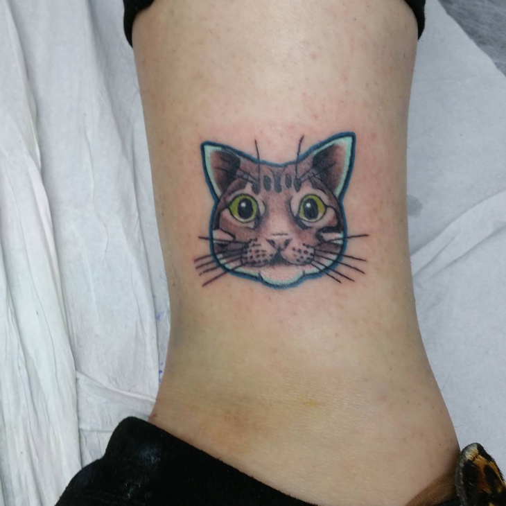 small cat tattoo design