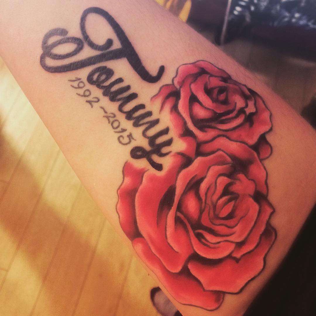 two roses rip tattoo design