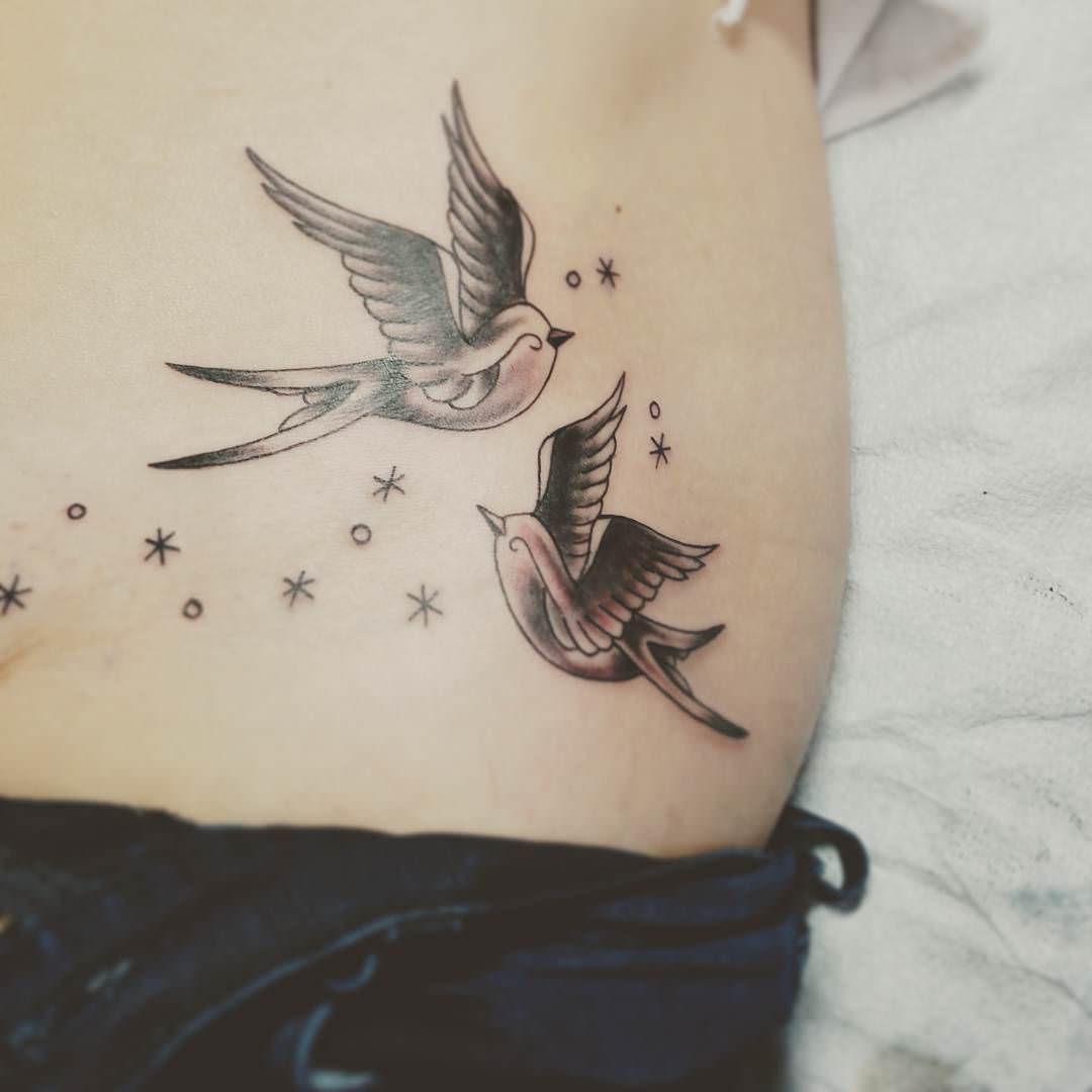 simple sparrow tattoo design