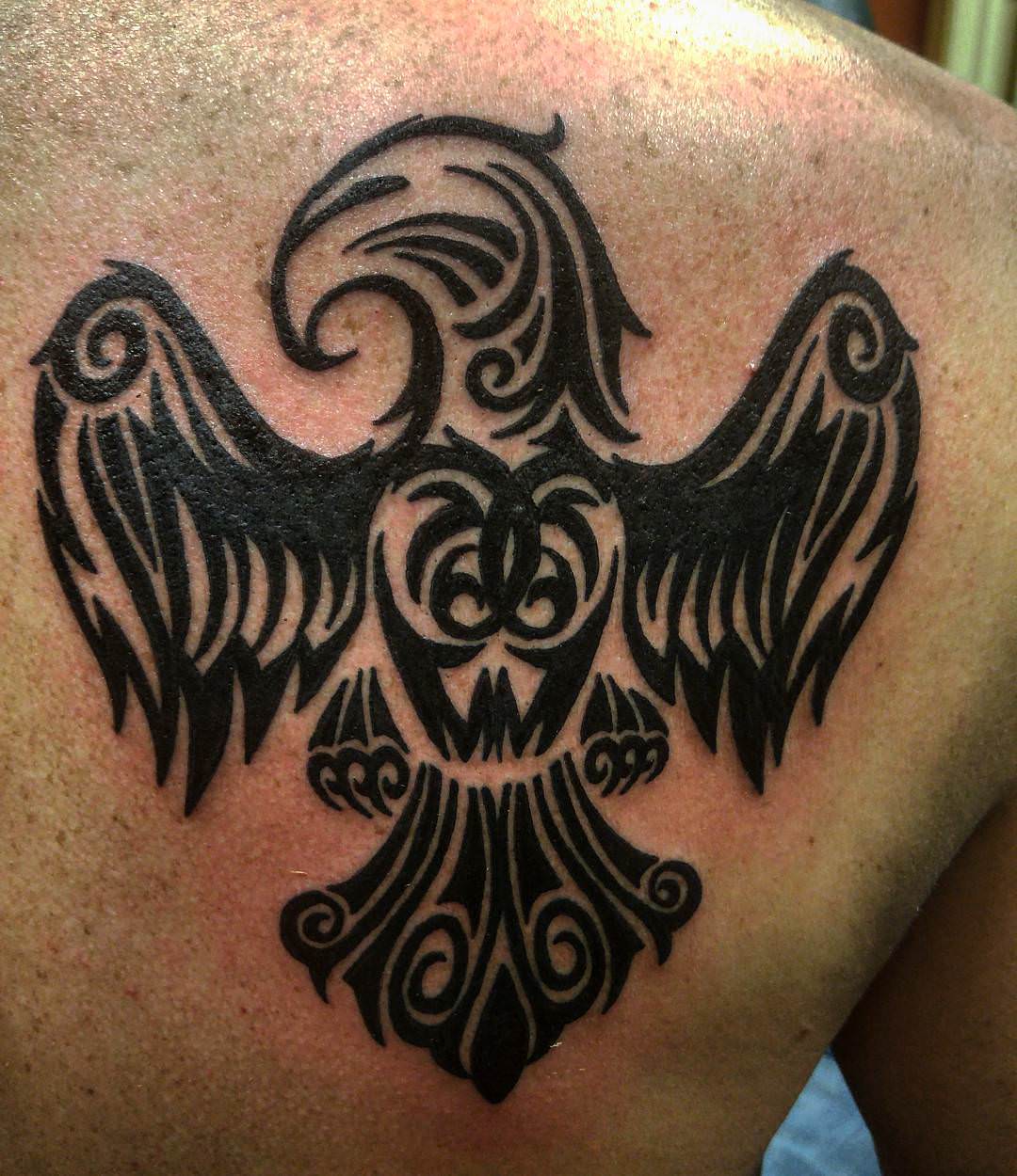 designed raven tattoo