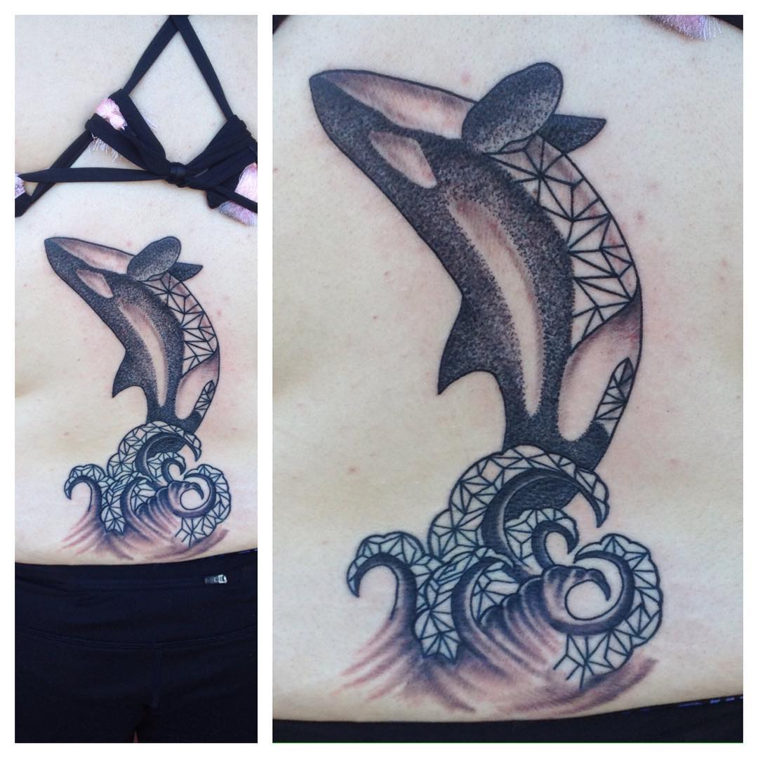 fish in the wave tattoo