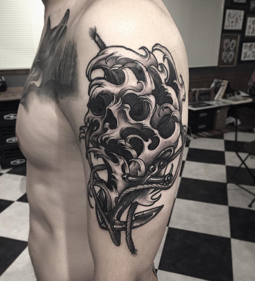 skull wave tattoo
