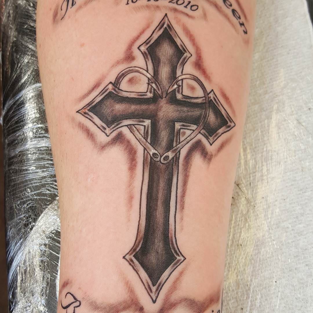 simple tattoo of cross