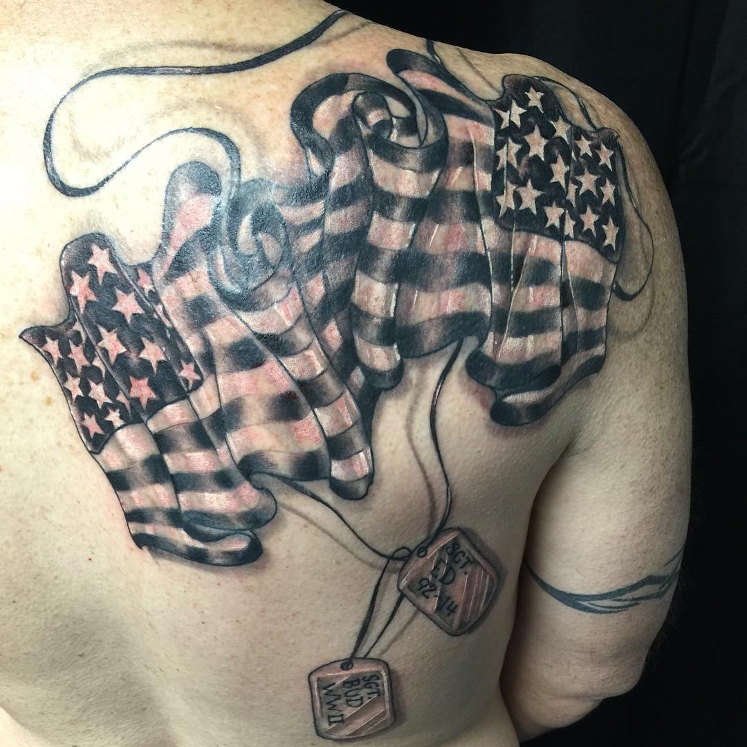 black flag tattoo on shoulder