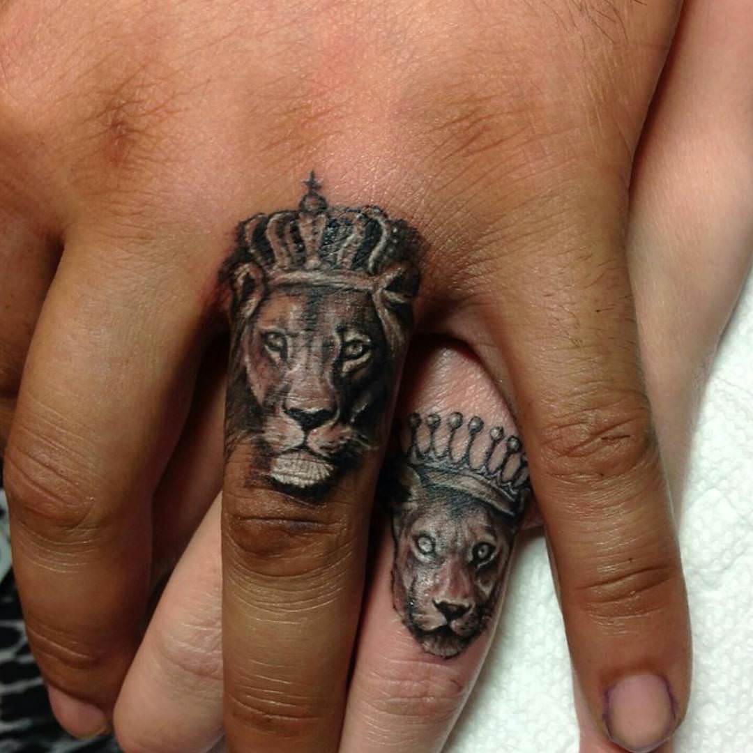 lion tattoo design on fingers