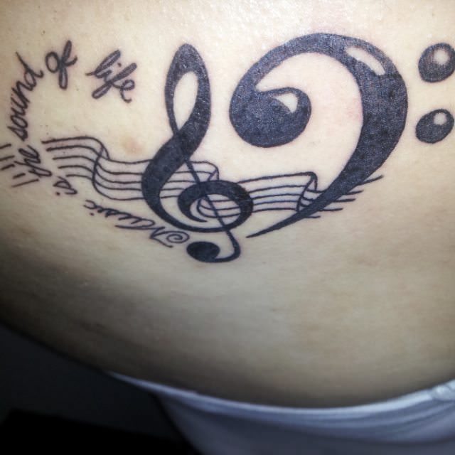 amazing music heart tattoo