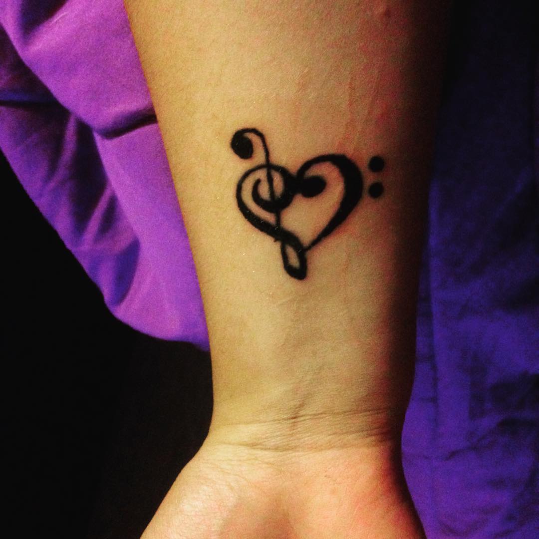 black music heart tattoo