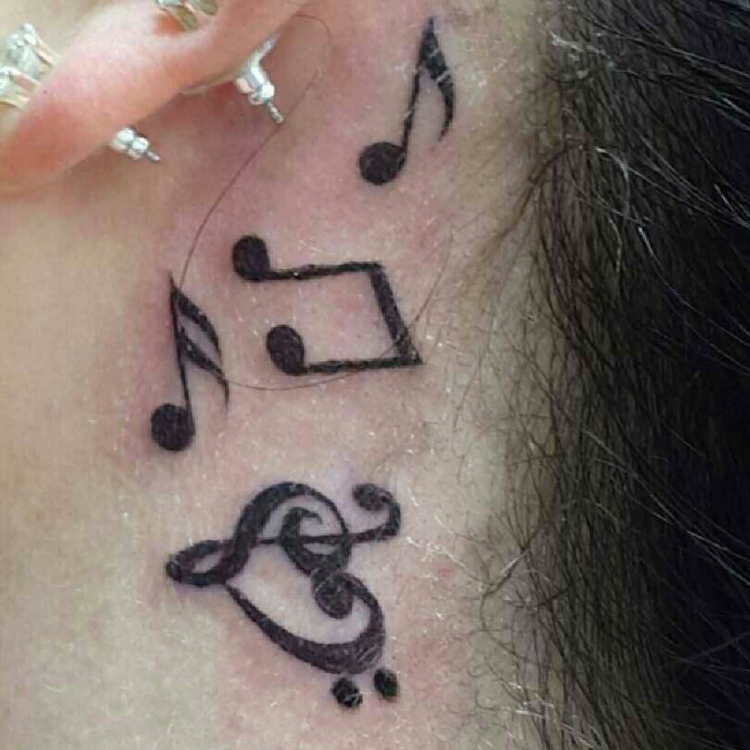 simple music heart tattoo