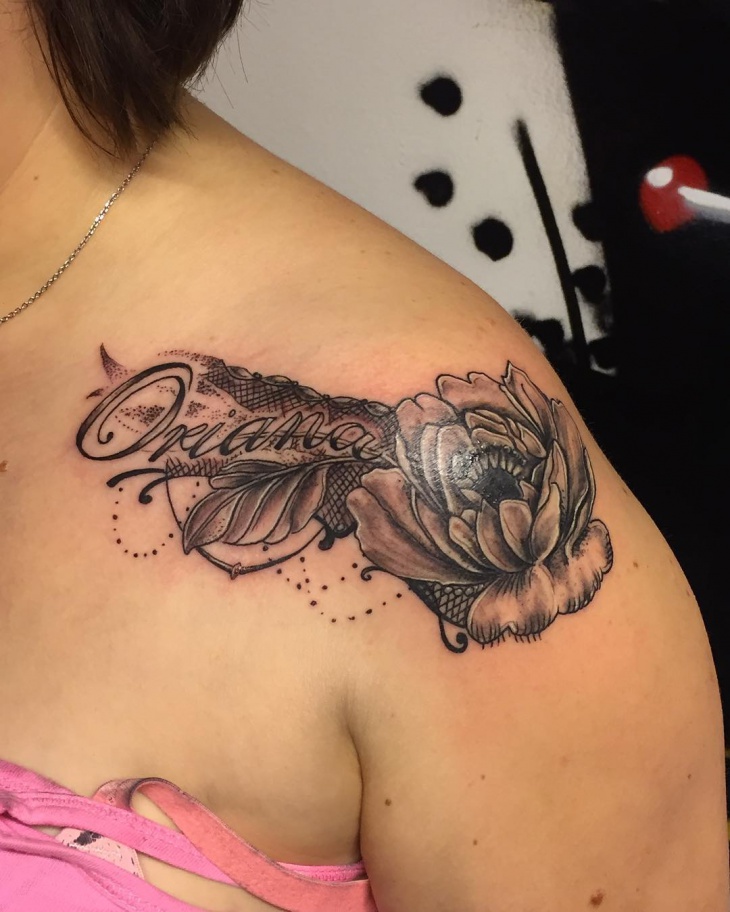 lace tattoo design on shoulder