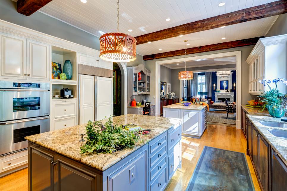 eclectic kitchen with two islands