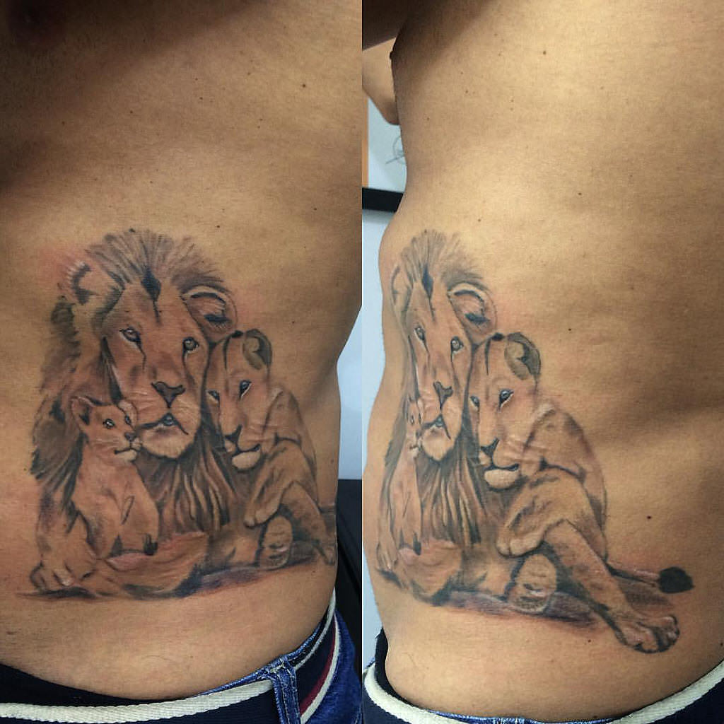lion family tattoo on hip