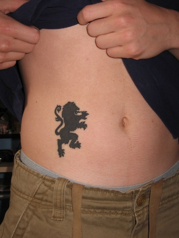 tattoo of rampant lion on hip