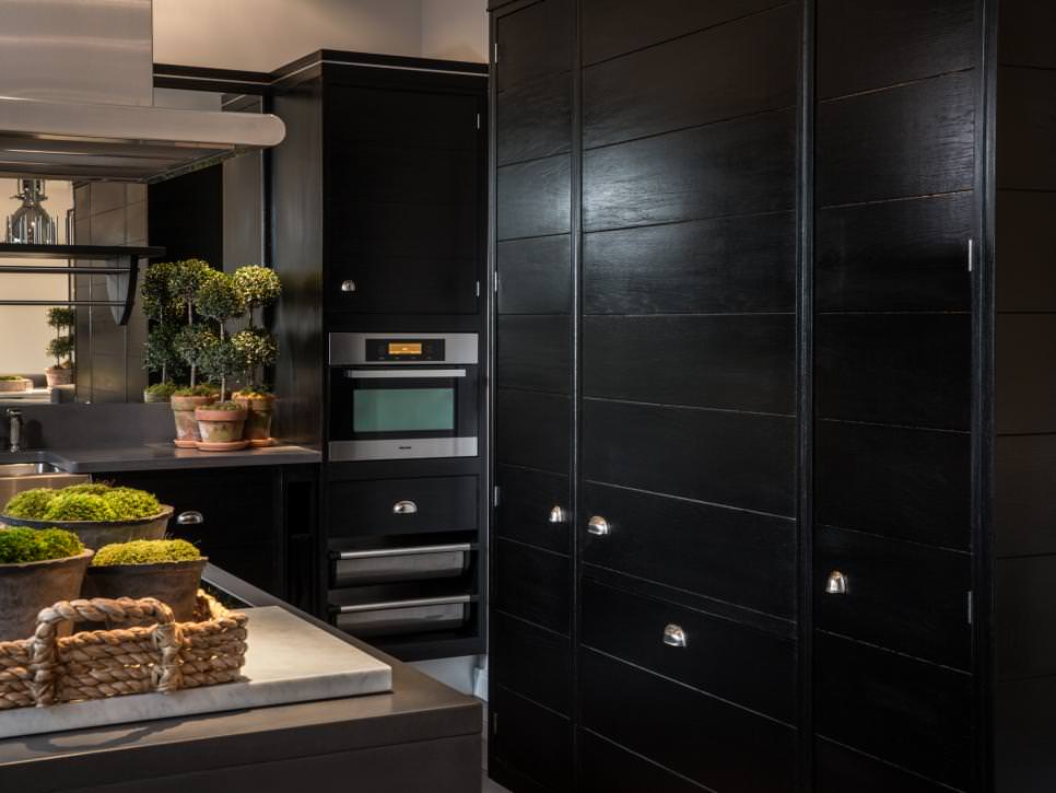 transitional kitchen with black cabinets
