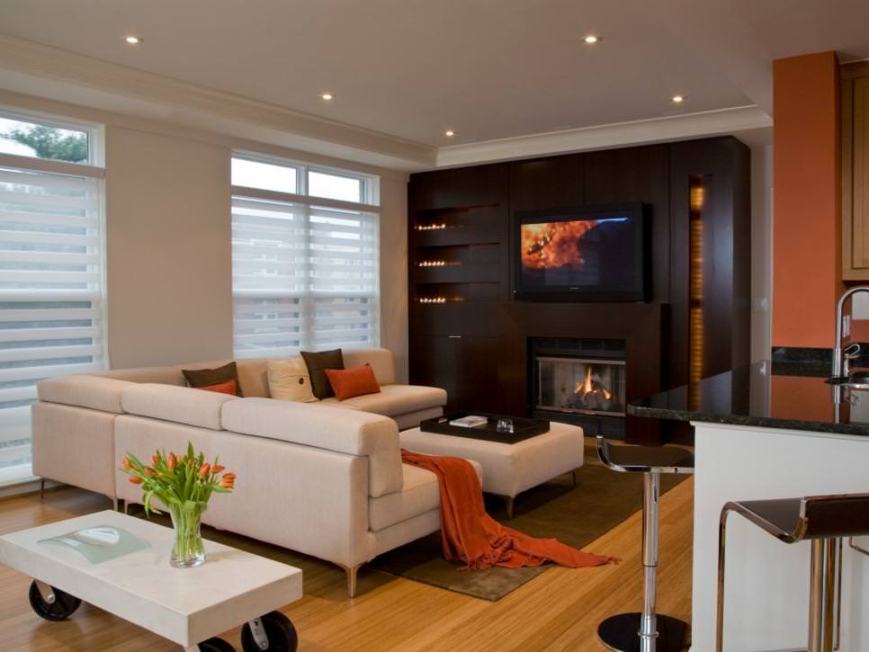 white and orange living room with wood wall