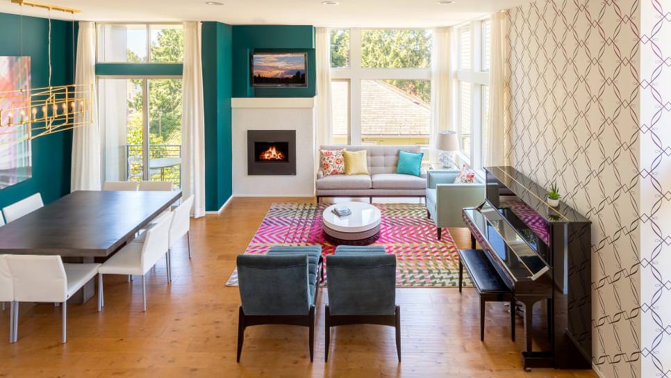 living room with wood floor teal wall