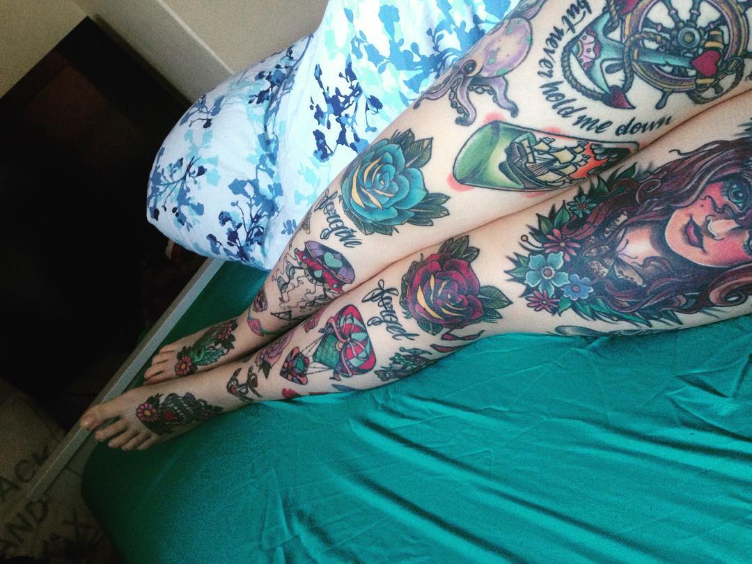 beautiful rose leg sleeve tattoo