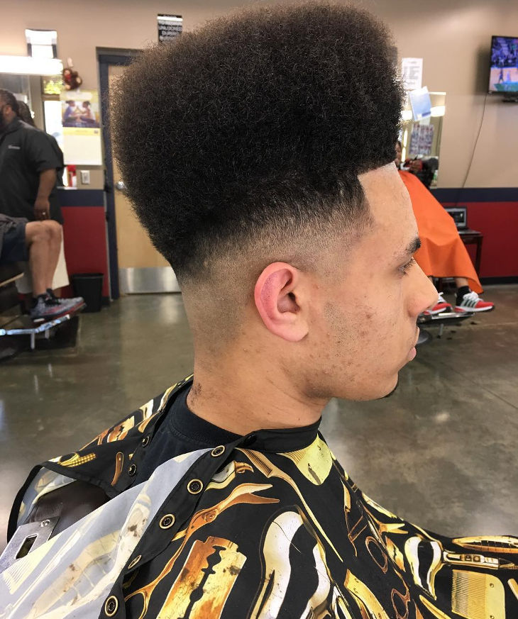 high curly fade hairstyle for men