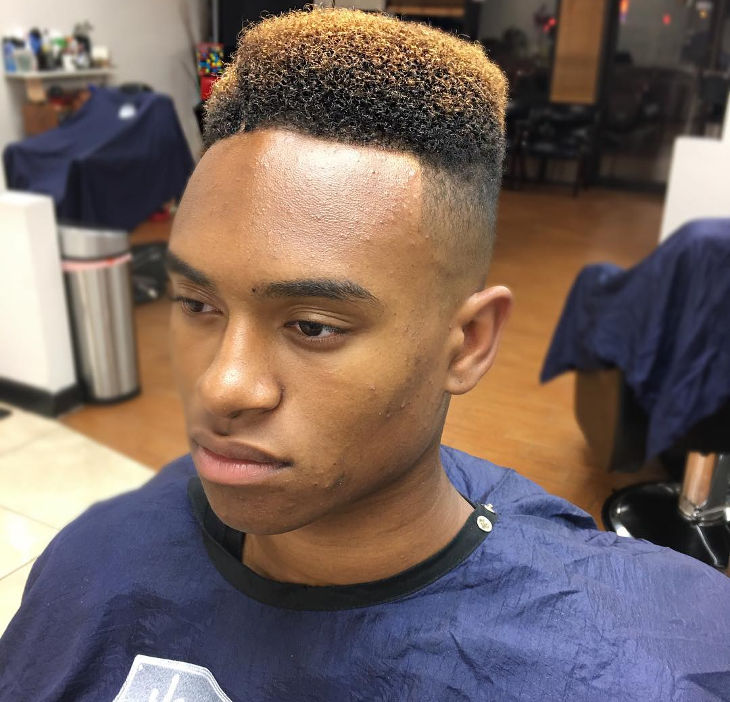 high top hair with shaved side part
