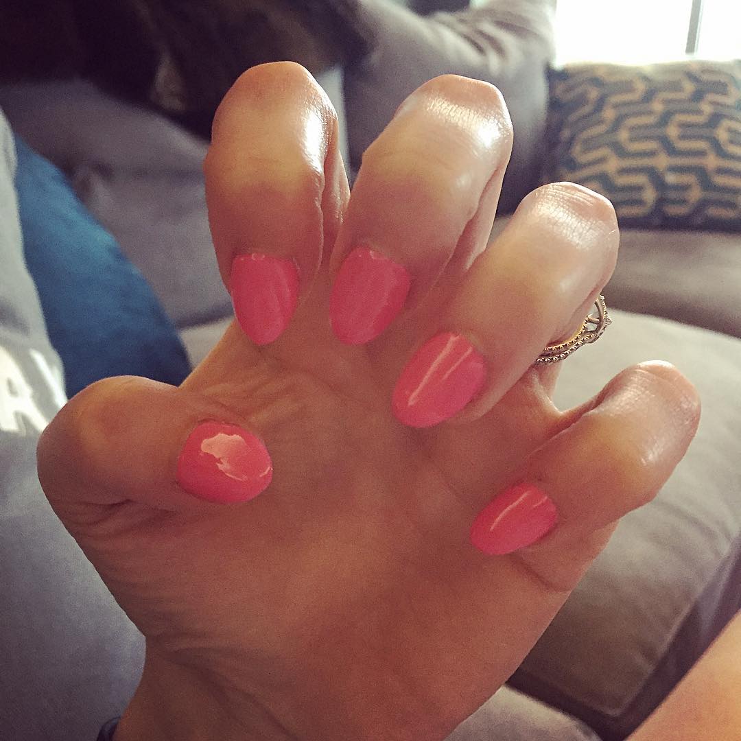dark pink short stiletto nails