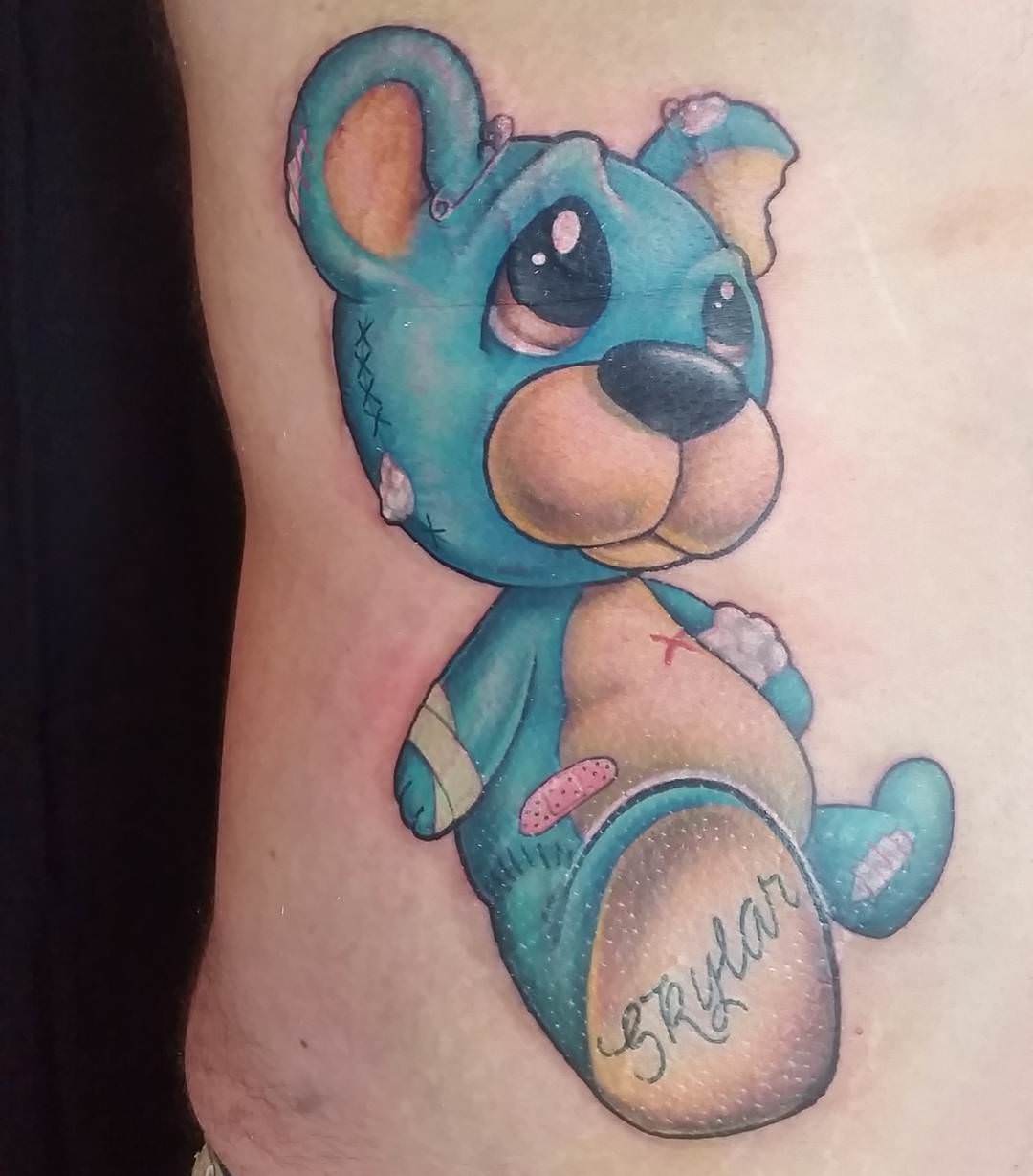 school teddy bear tattoo