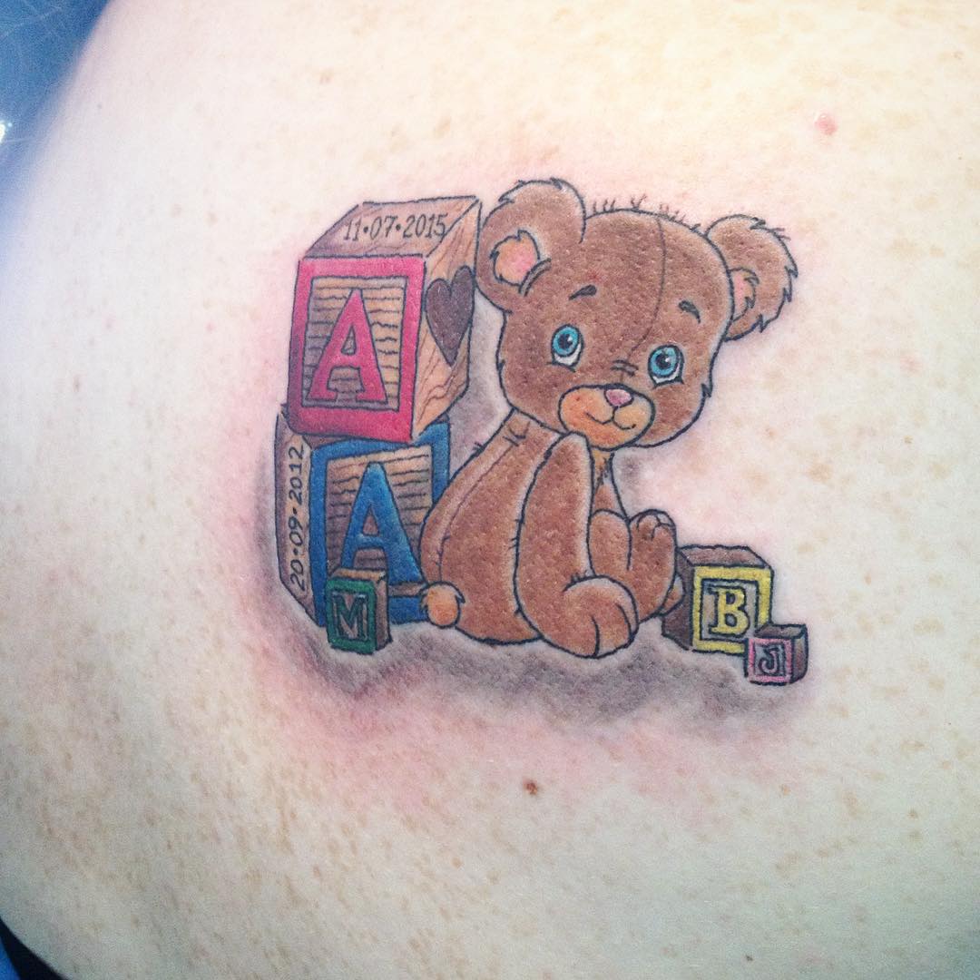 cute little teddy with blocks tattoo