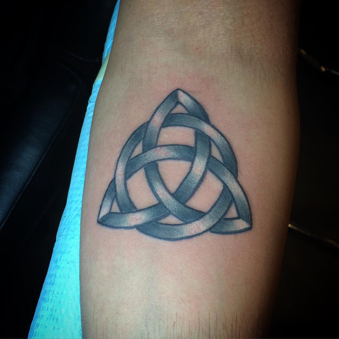 simple tattoo of triquetra