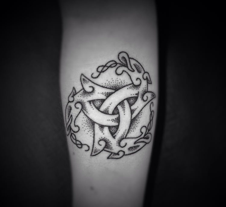 hand poked dragon triquetra