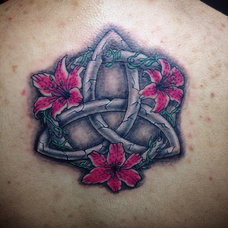 triquetra with flowers tattoo