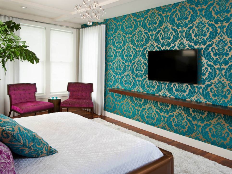 master bedroom with bold blue accent wall design