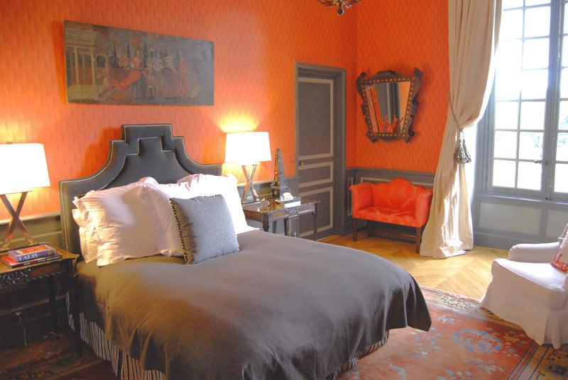eclectic orange bedroom design