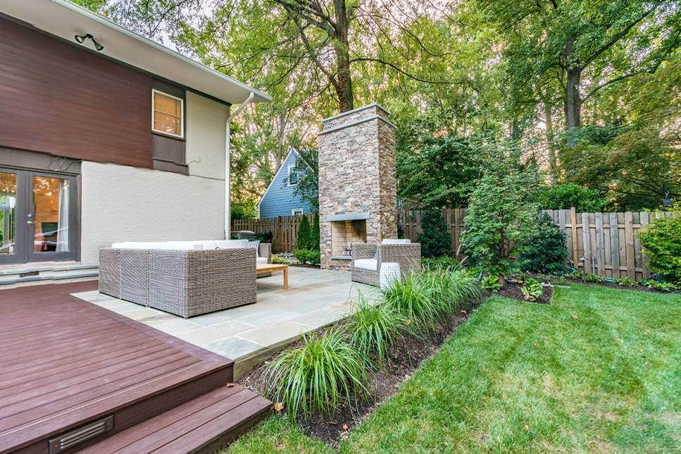 two tone exterior design with outdoor room