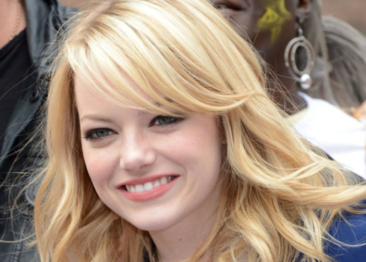 medium layer haircuts for round faces like emma stone
