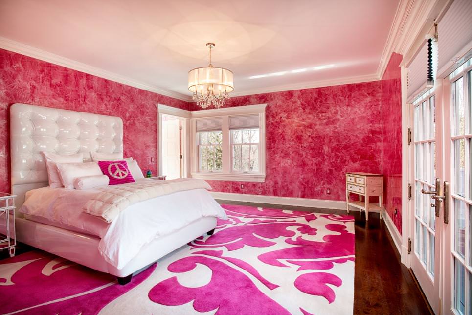 pink bedroom with shiny pink chandelier