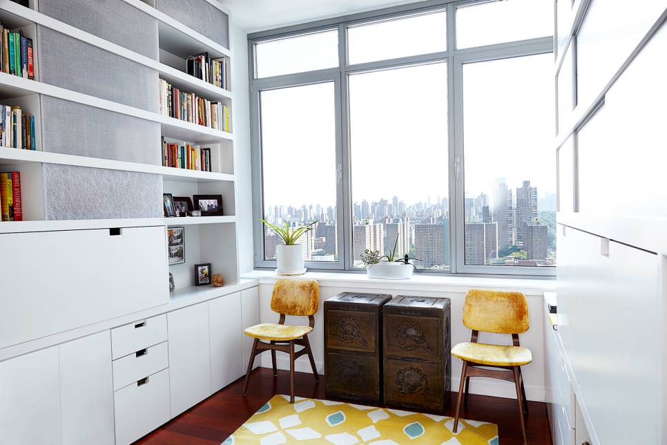home office with sleek white shelves design