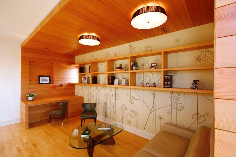 elegant home office with wooden shelves design