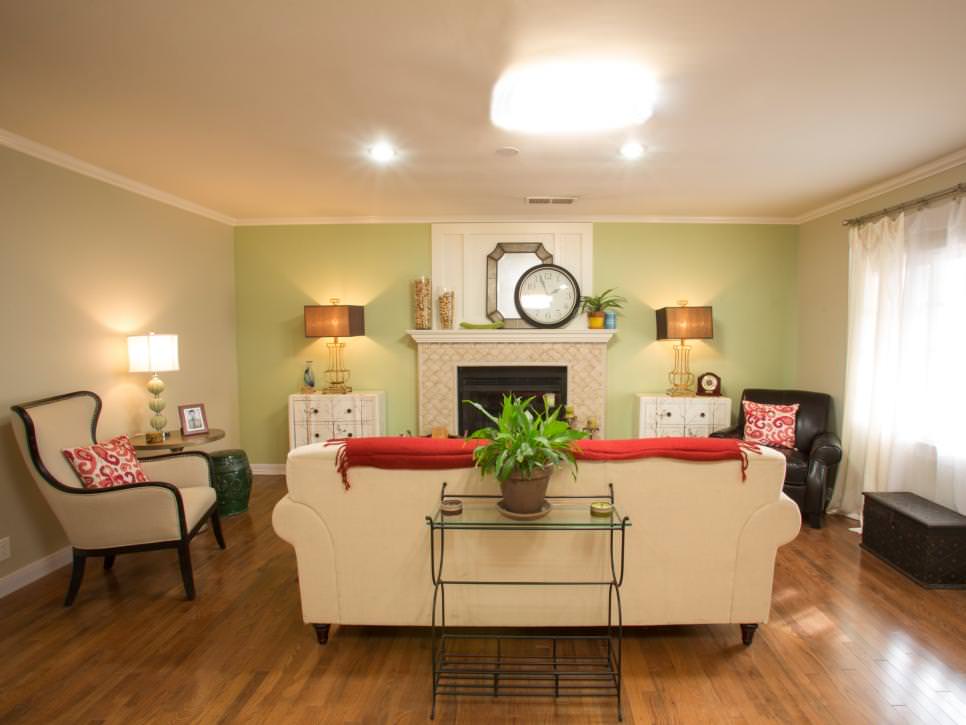 traditional cream living room with green accent wall