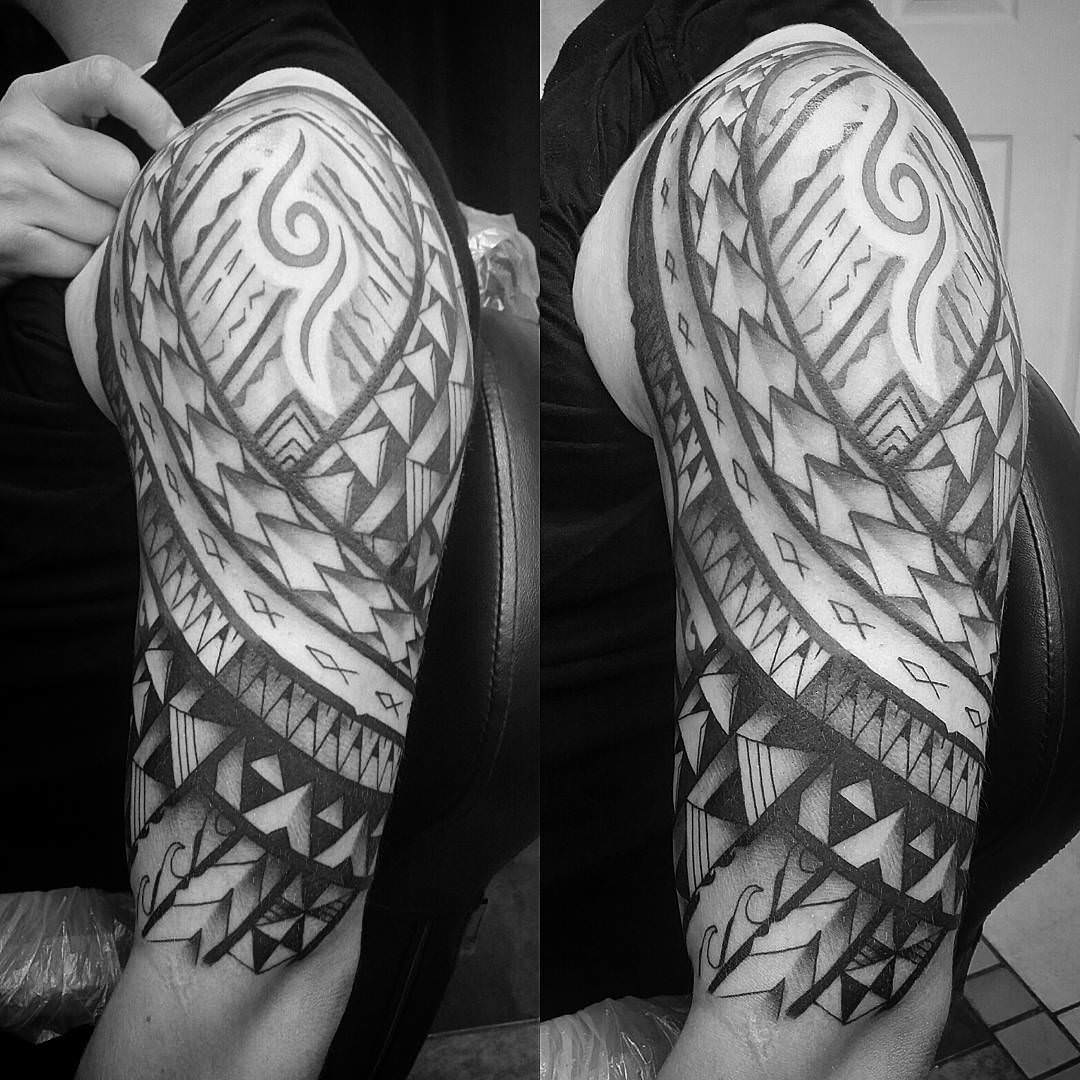 poly tribal arm tattoo
