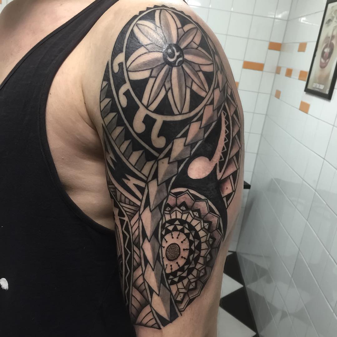 black and grey arm tattoo