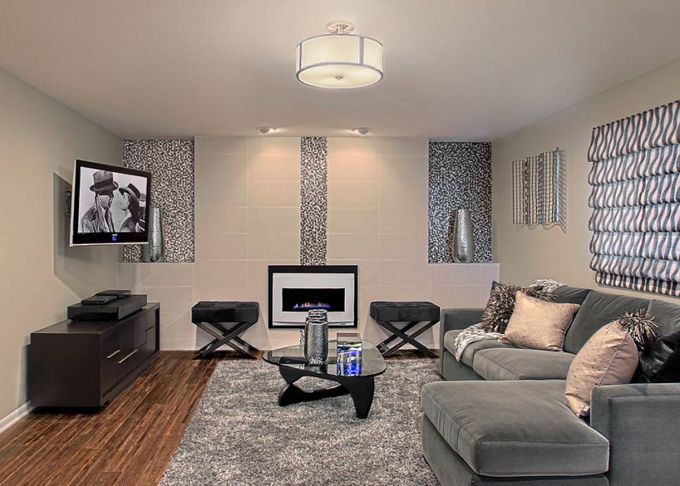 snazzy family room with mosaic tile accent wall
