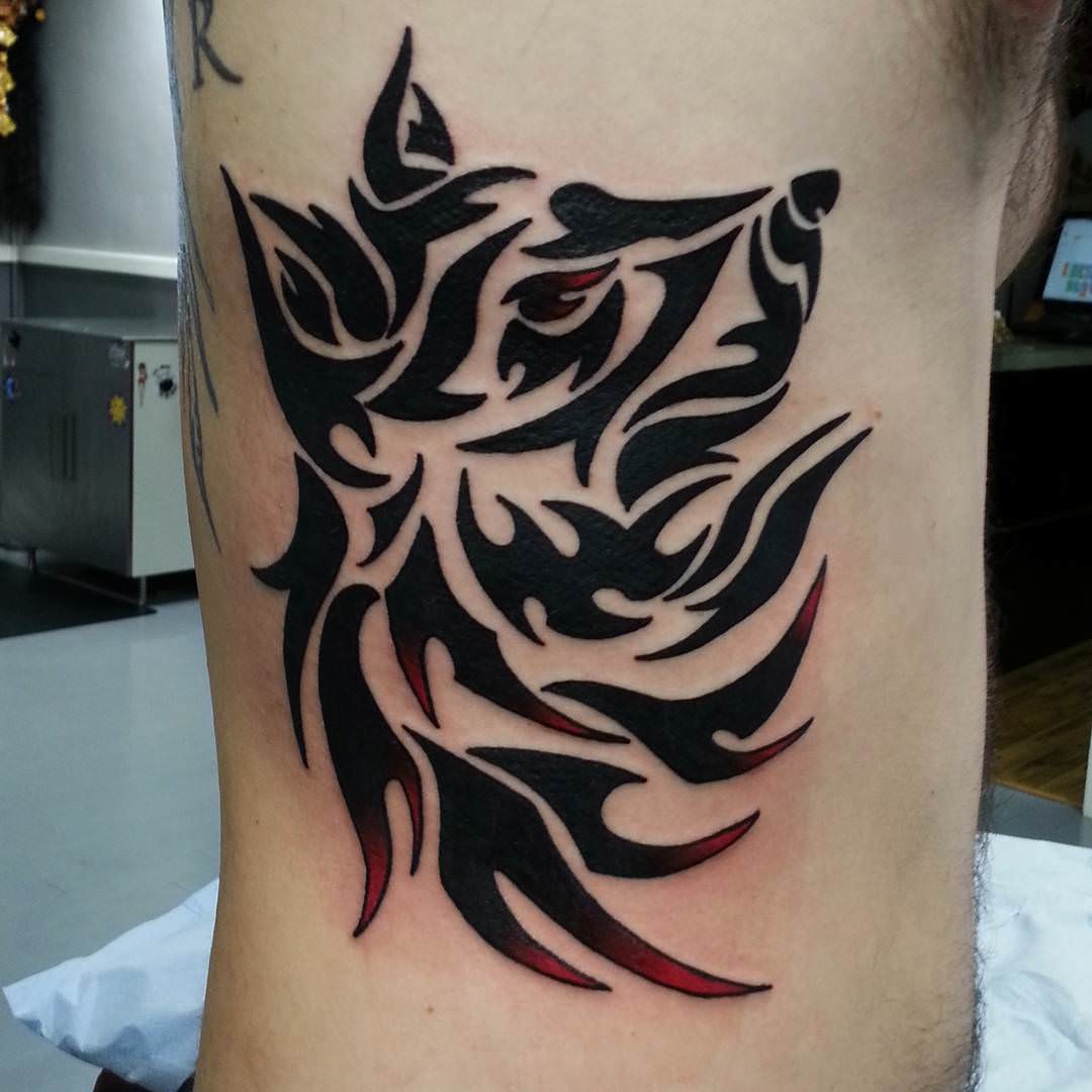 dark black red tribal tattoo