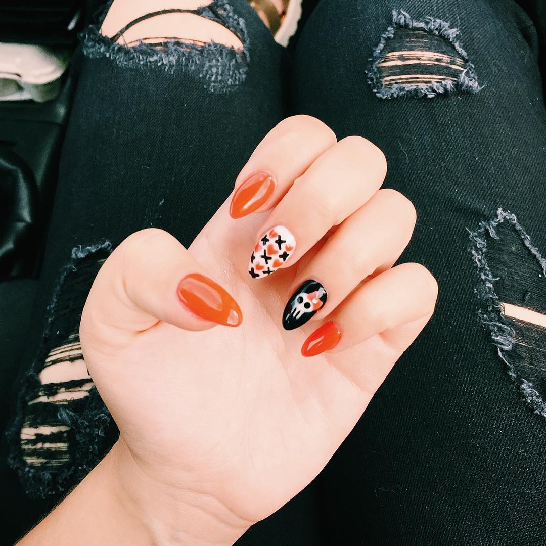 skull orange nail design