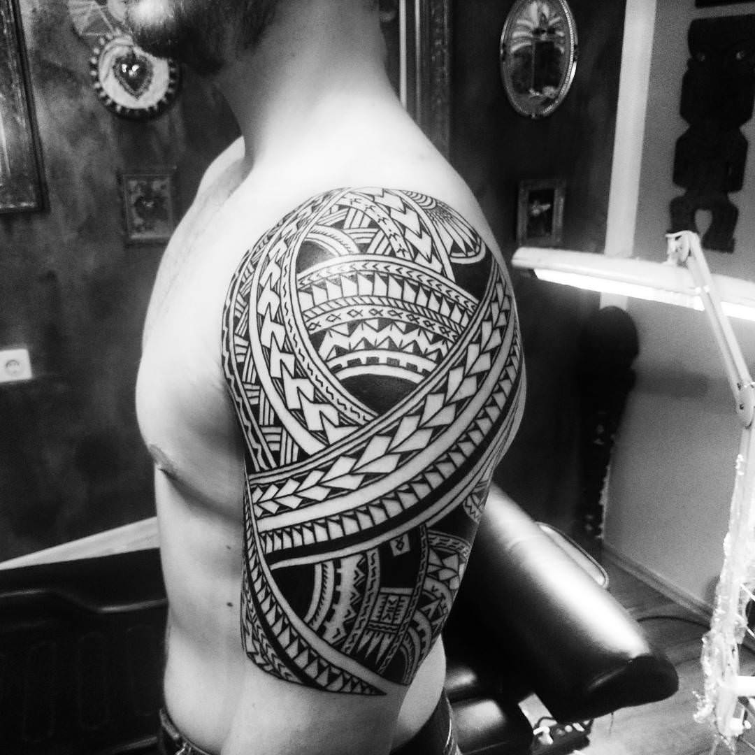 tattoo design on upper arm